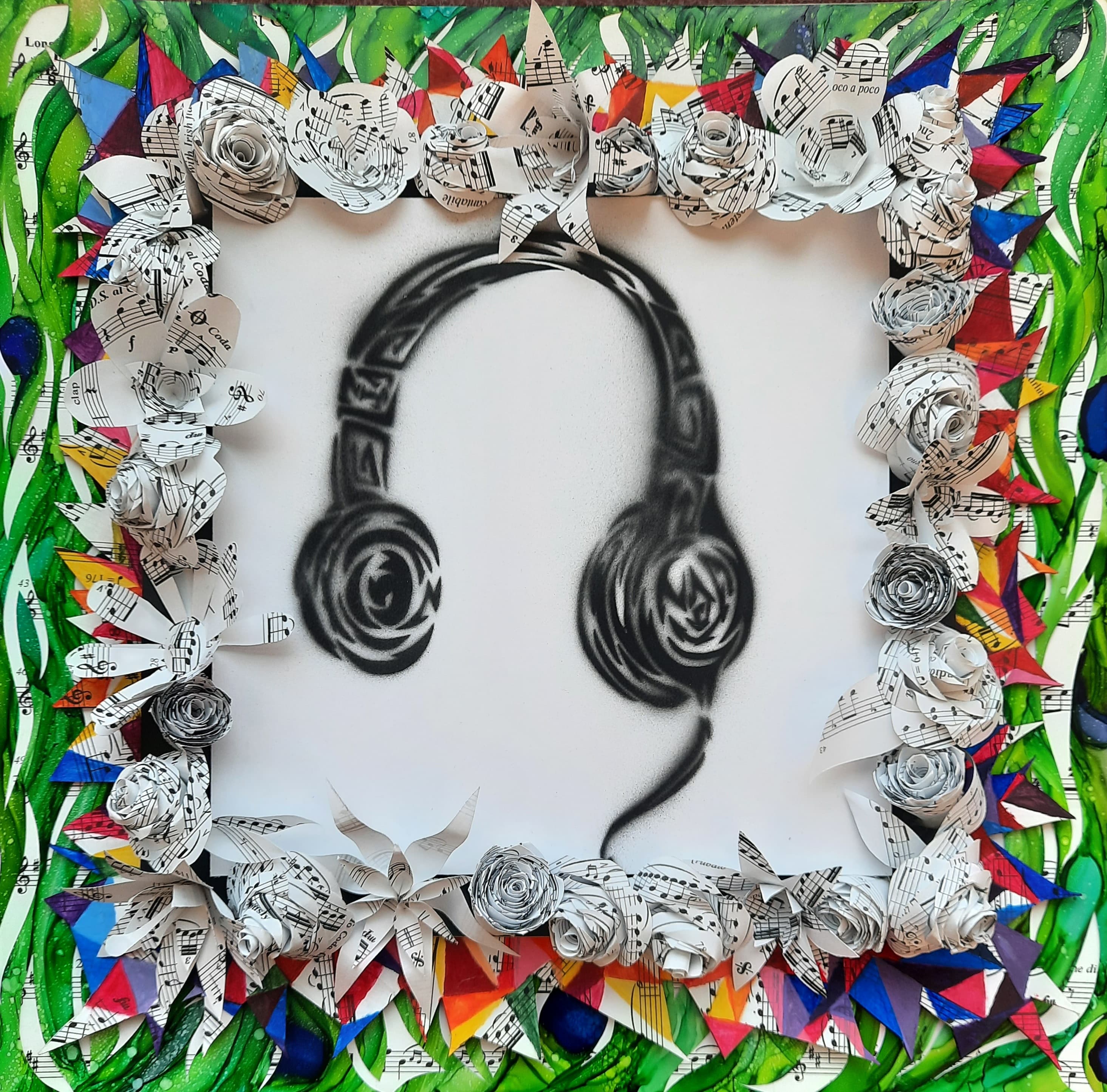 Headphones, sheet-music collage