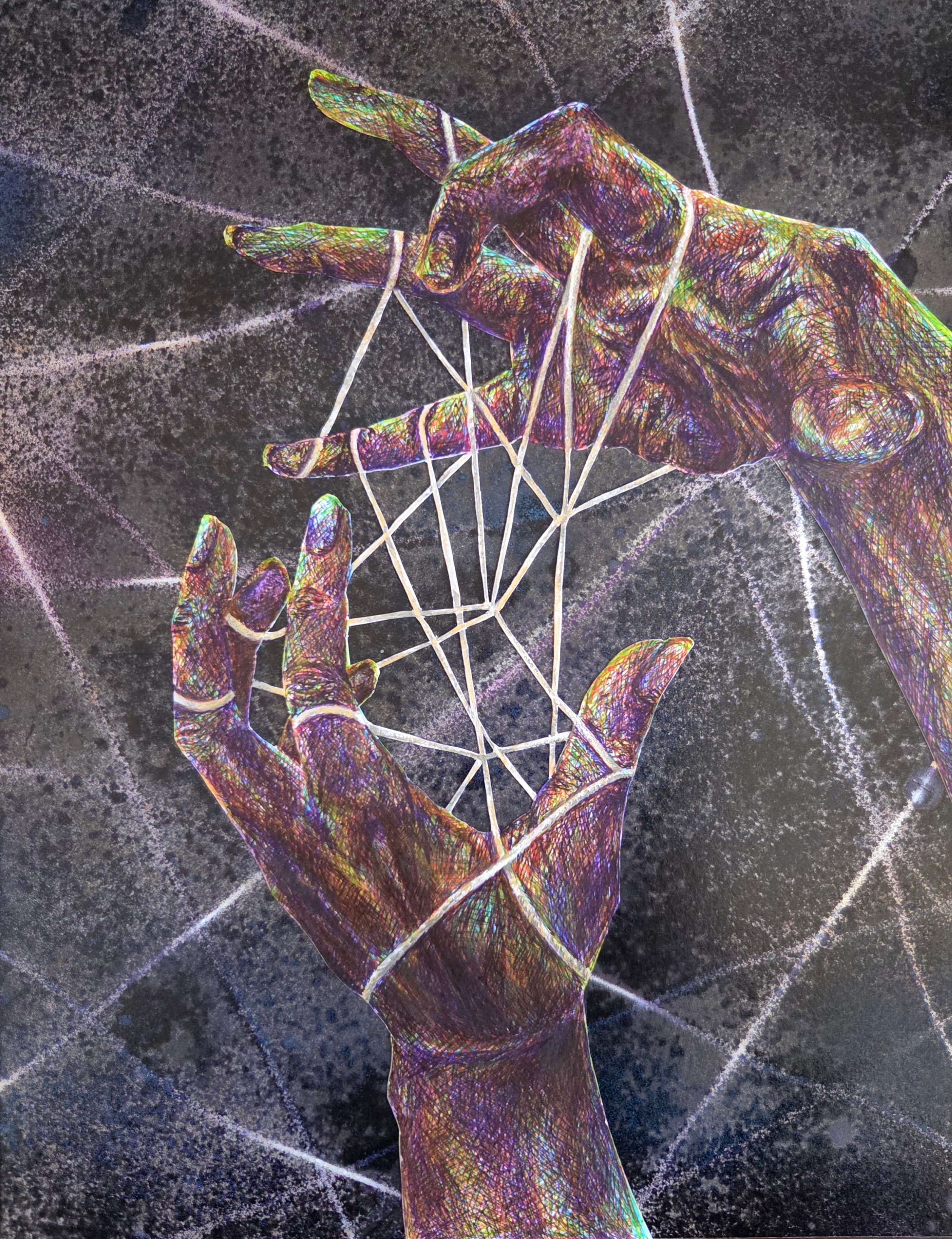 Hands playing cat's cradle